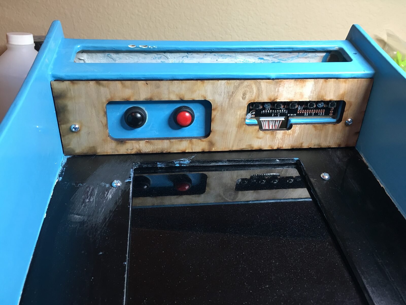 The control panel with its arcade buttons and switches wired up