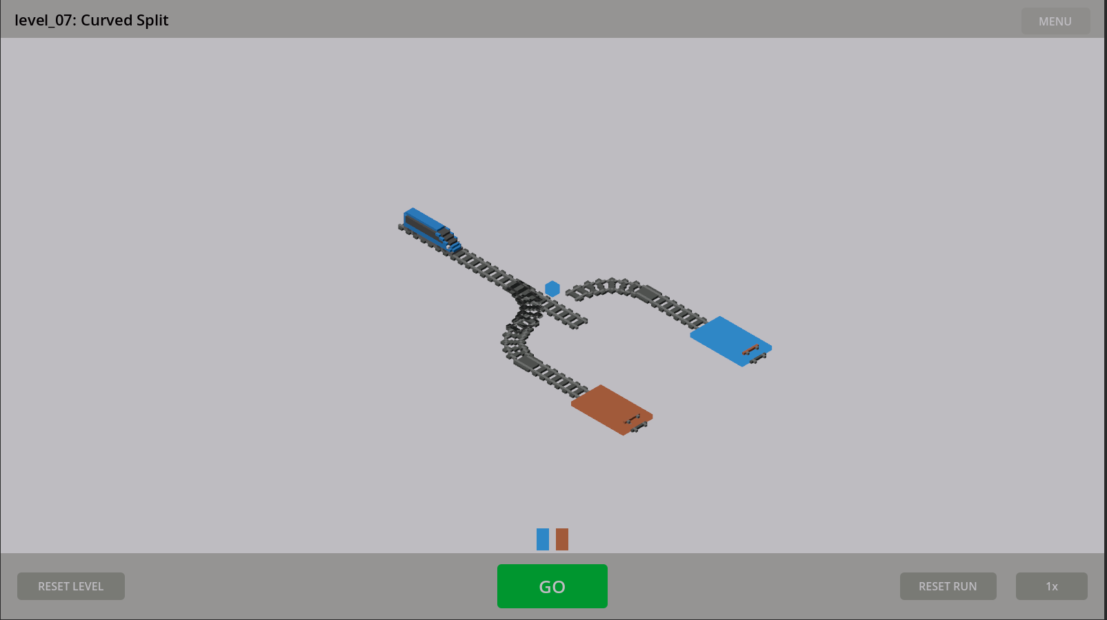 Switchyard level 7, Curved Split: a blue voxel train facing a junction where curved track forks toward a blue platform and an orange platform