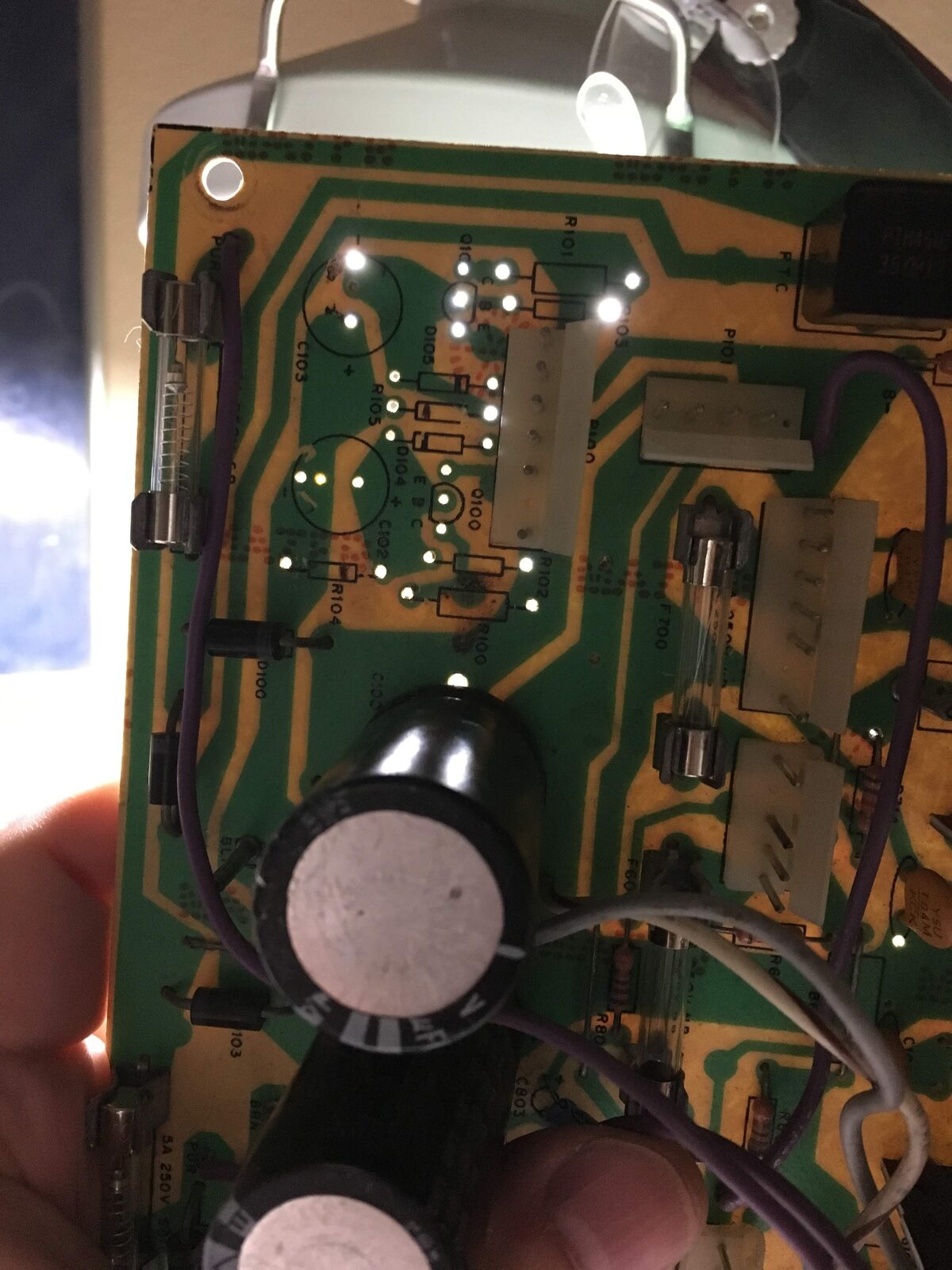 A Tempest circuit board mid-repair with freshly replaced capacitors